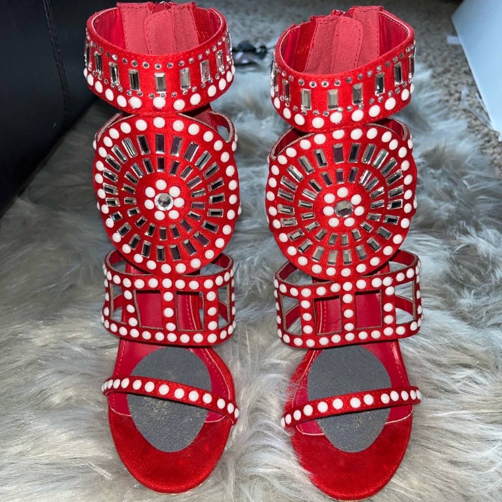 Red embellished heels